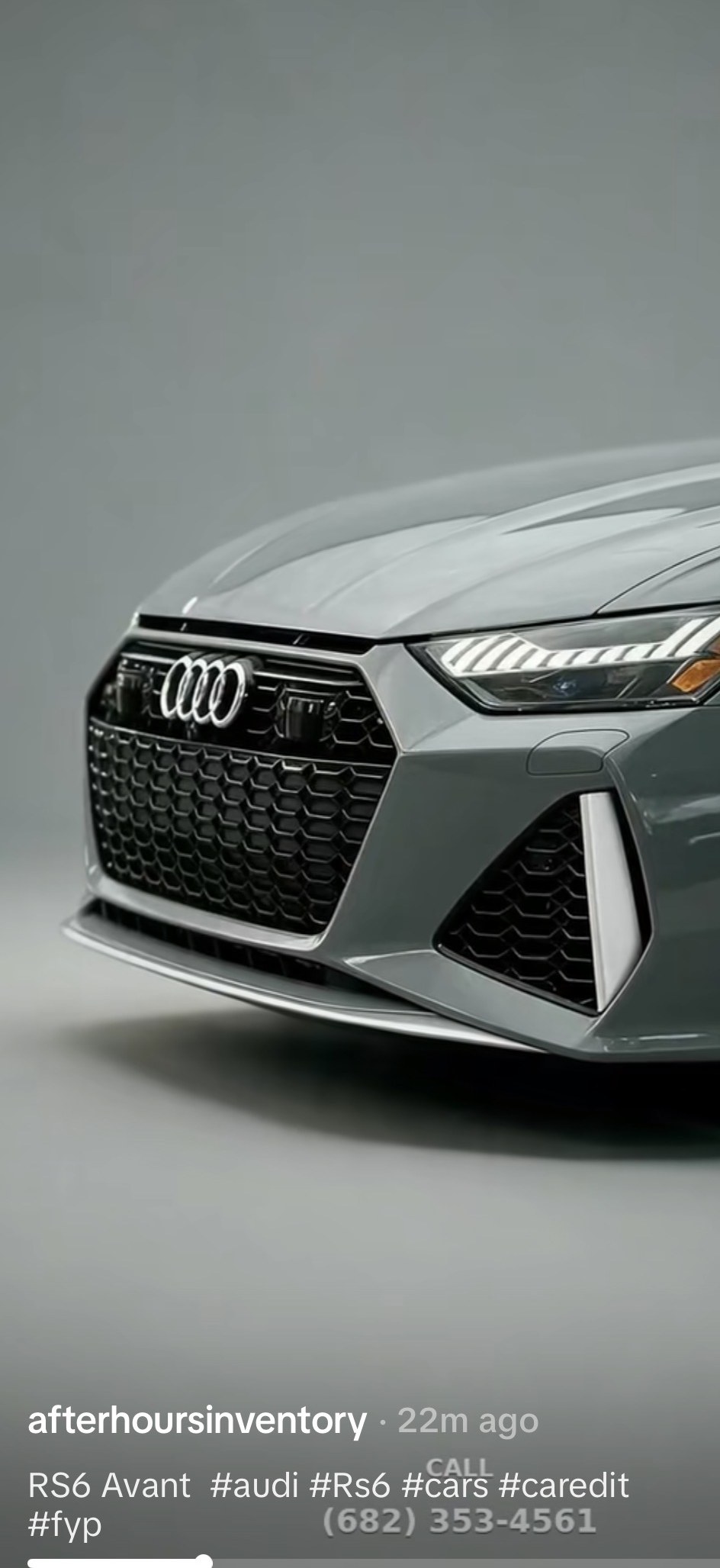 TikTok post: the studio's film of a grey 2021 Audi RS 6 Avant, shot from the front, with the store's phone number on screen